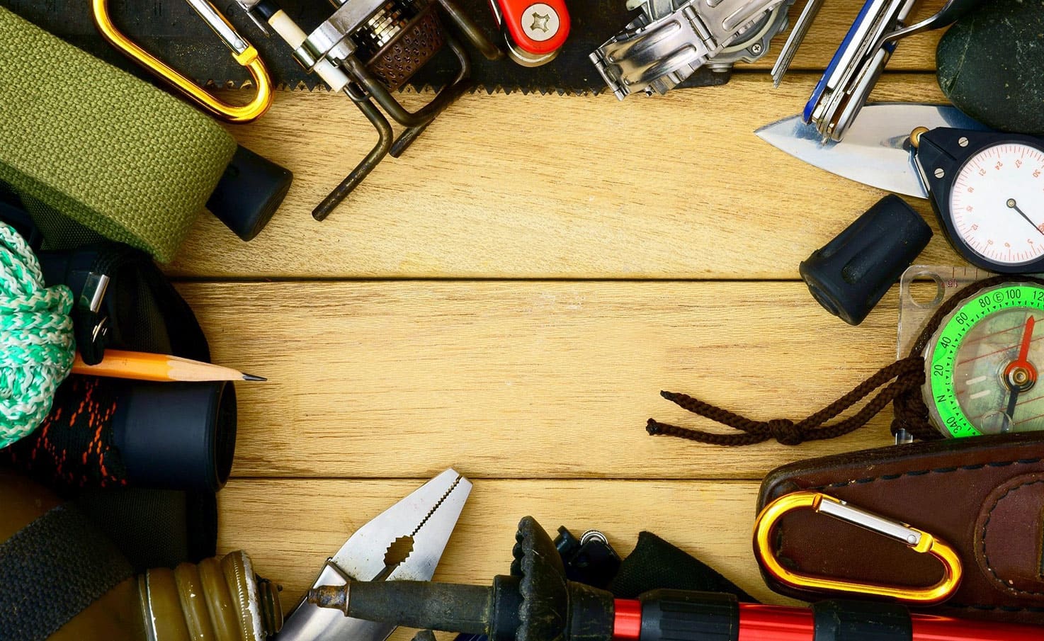 A wooden table with many different tools on it